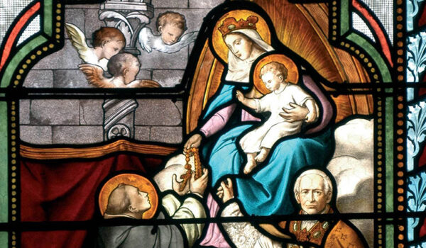 Blessed Mother giving the rosary